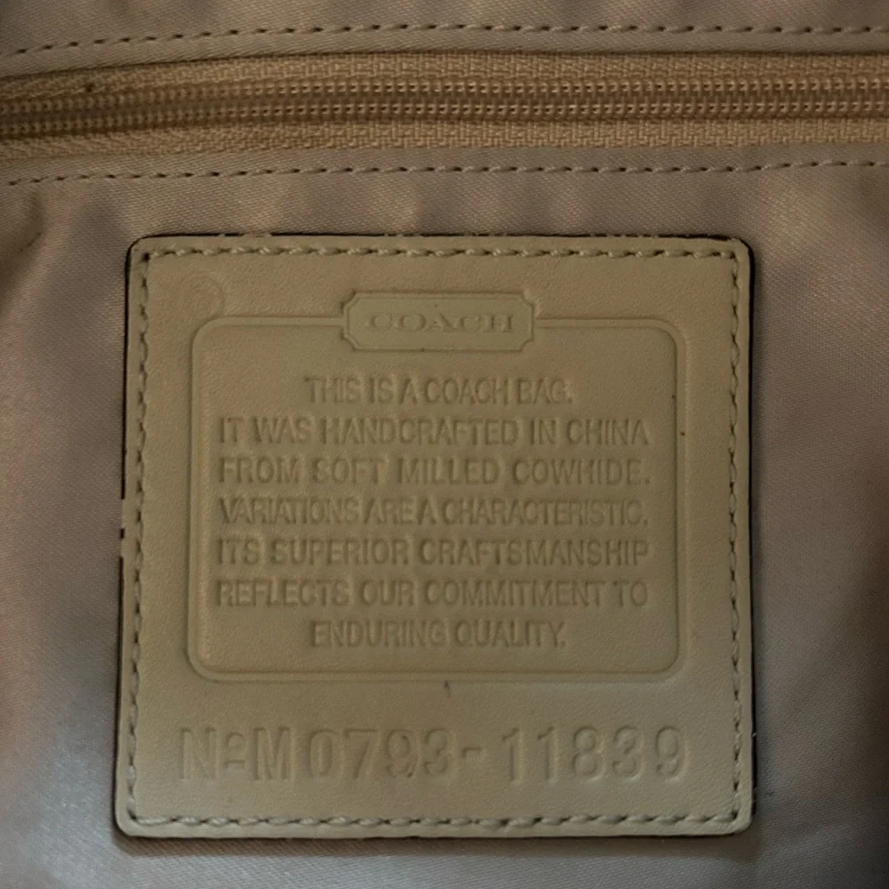 Coach | Women’s cream pebbled leather round bottom over the shoulder purse, OS